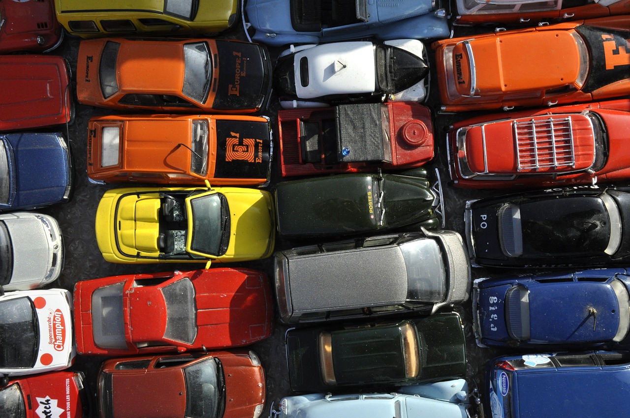 Small cars standing in a few rows