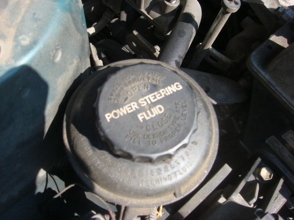 Power Steering Fluid Compartment